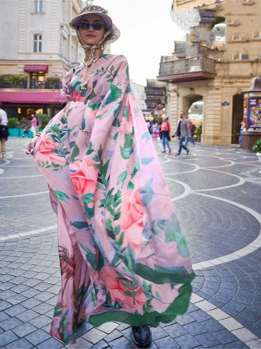 Pink floral ethnic gown with green leaves, styled with hat and sunglasses for street fashion