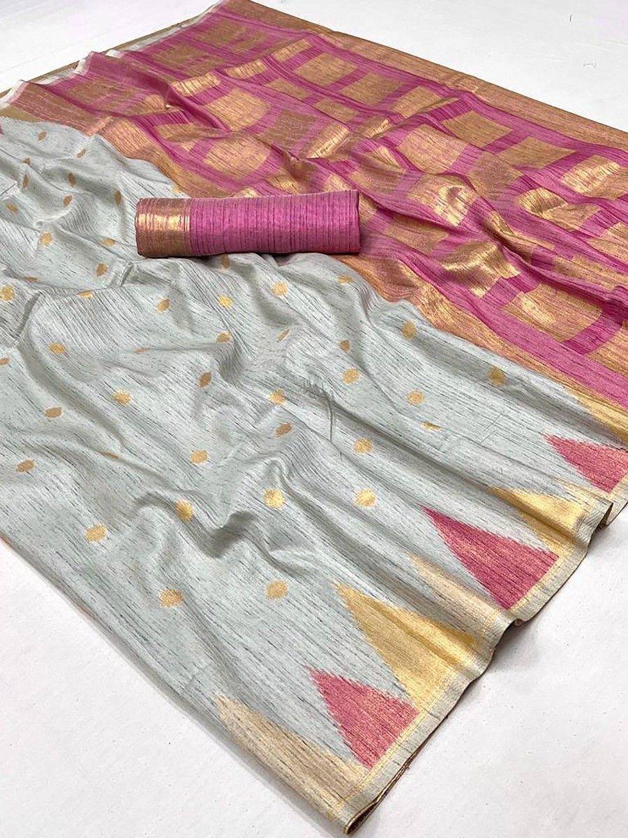 Grey and pink ikat saree with gold dots and geometric border, perfect for ethnic wear occasions
