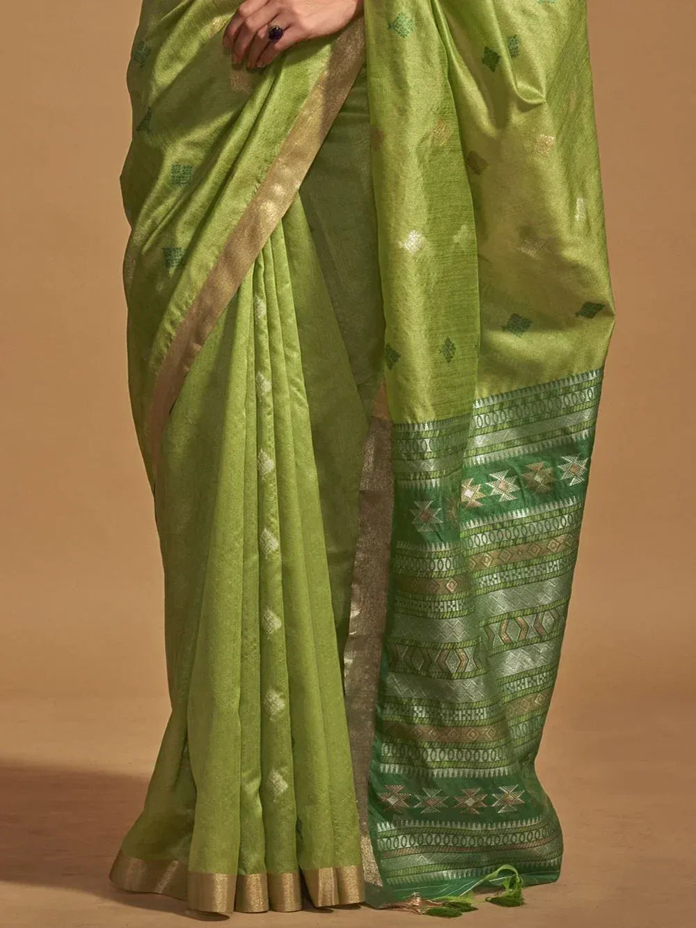 Lime green ethnic saree with gold border and geometric pallu, perfect for Indian occasions