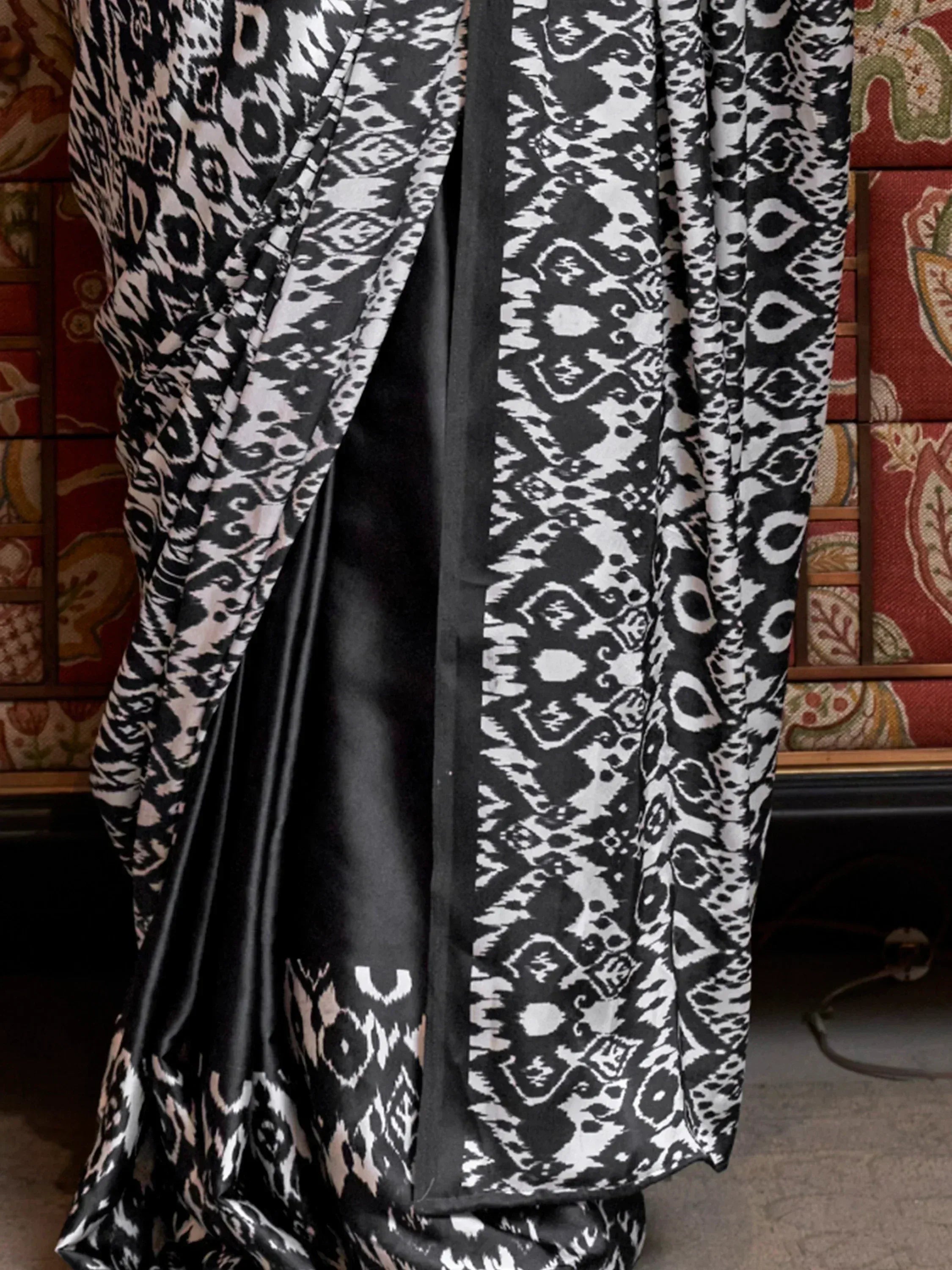 Black and white ikat print saree with geometric pattern, ethnic wear for women