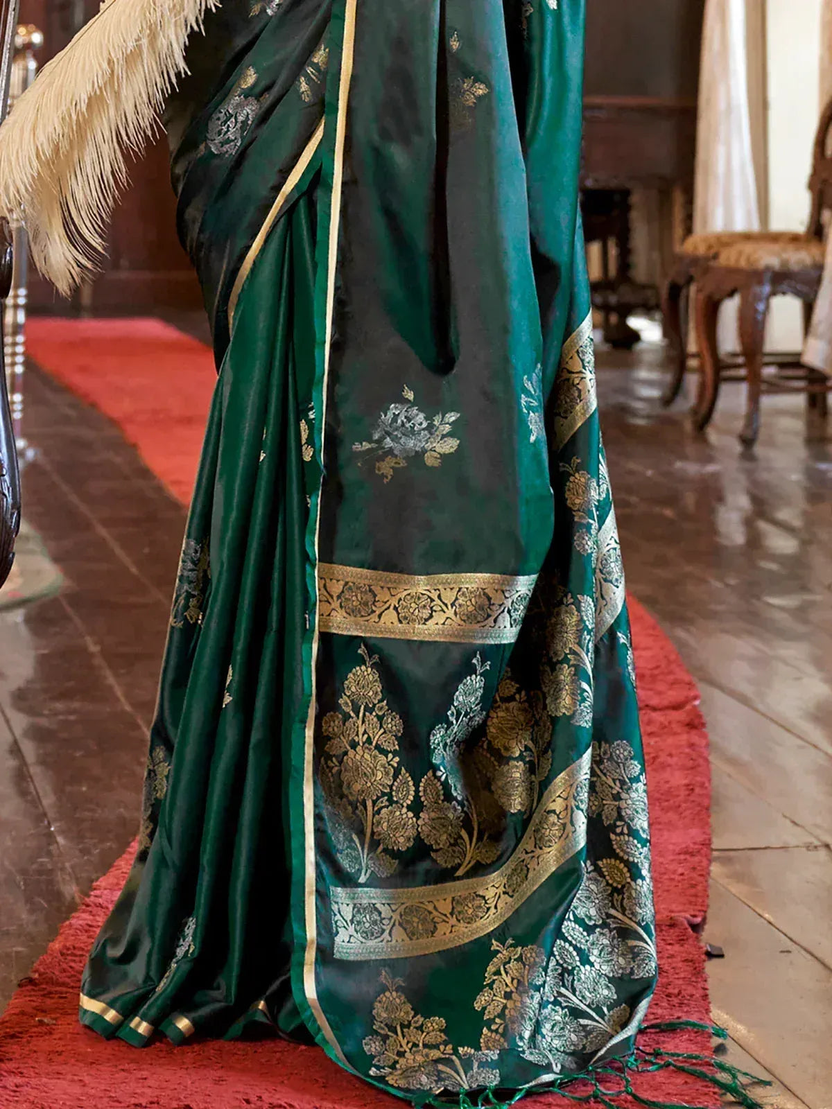 Emerald green designer saree with gold floral embroidery and border, ethnic wear for women