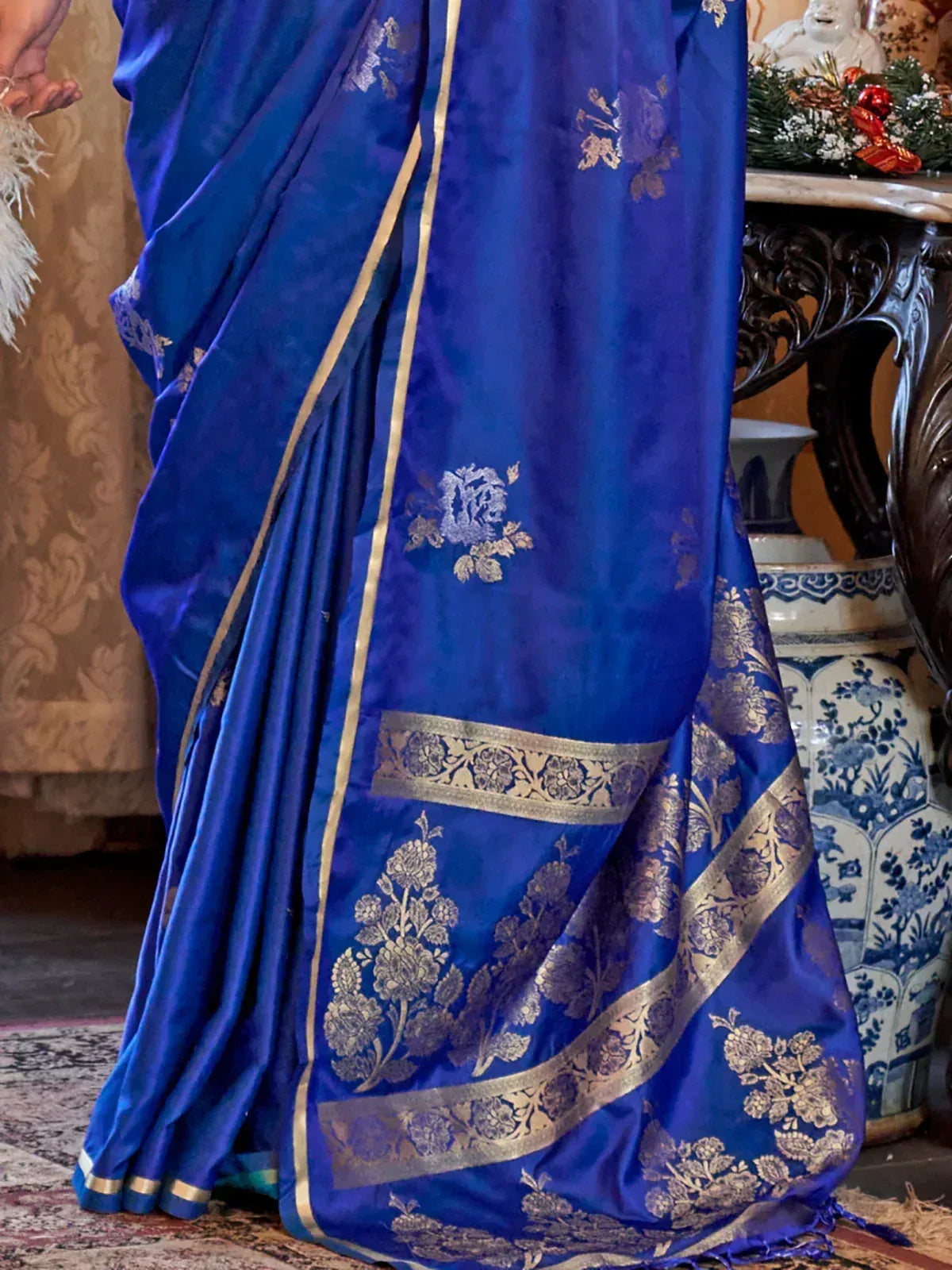 Royal blue silk saree with gold floral embroidery and border, ideal for Indian ethnic occasions