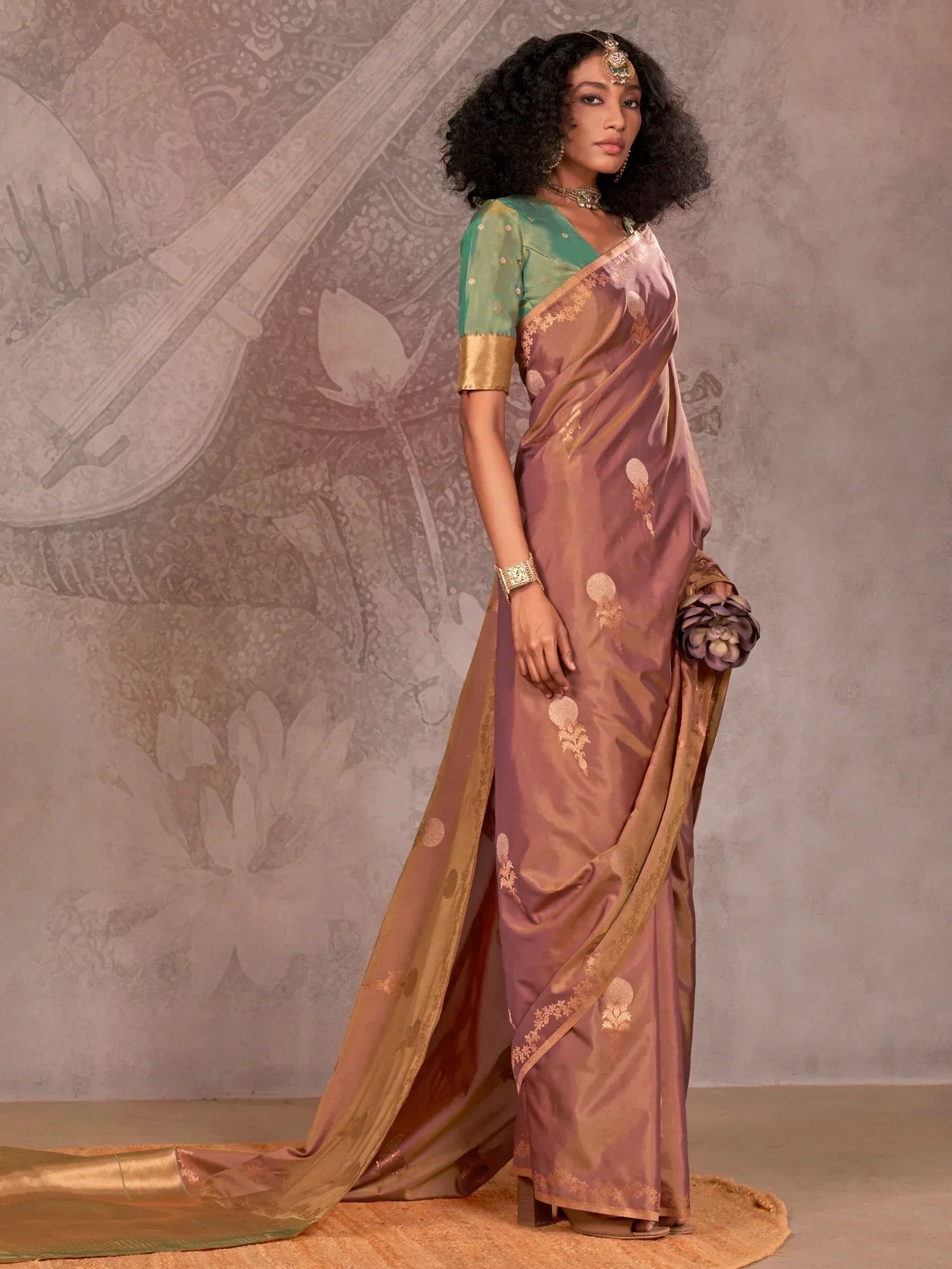 Elegant mauve silk saree with gold embroidery, paired with green blouse, perfect for Indian ethnic occasions