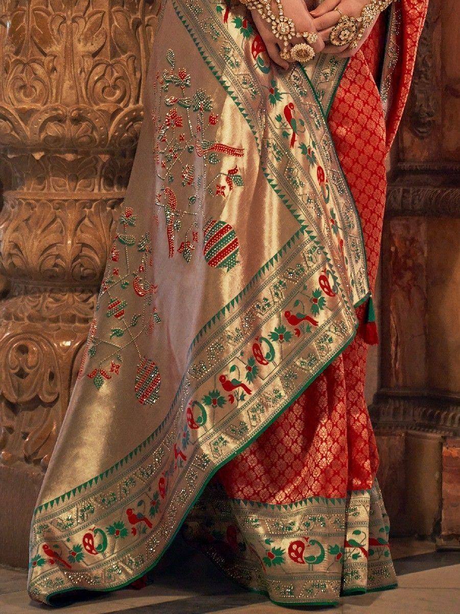 Elegant Indian saree with red and gold embroidery, peacock motifs, and festive designs for ethnic wear