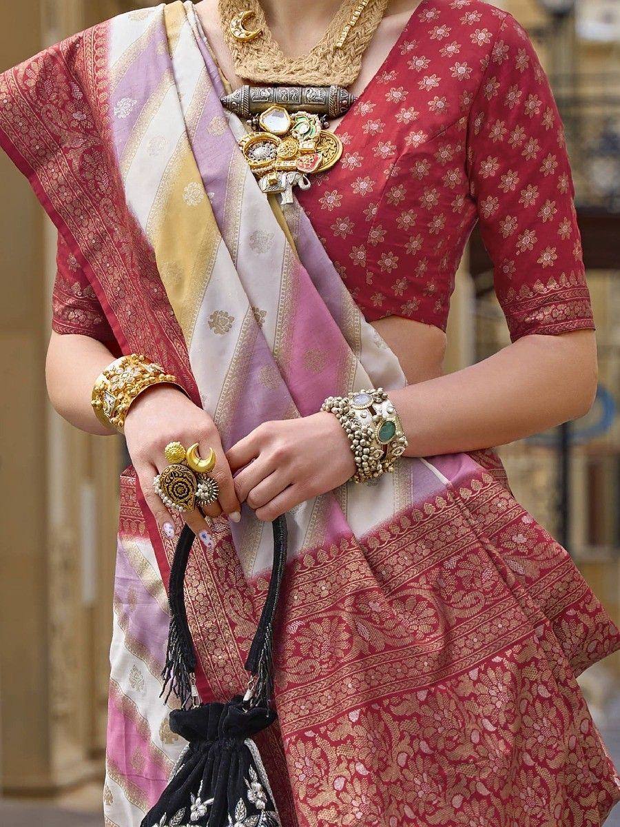 Red floral lehenga choli with pink and gold saree, traditional Indian ethnic wear, ornate gold jewelry