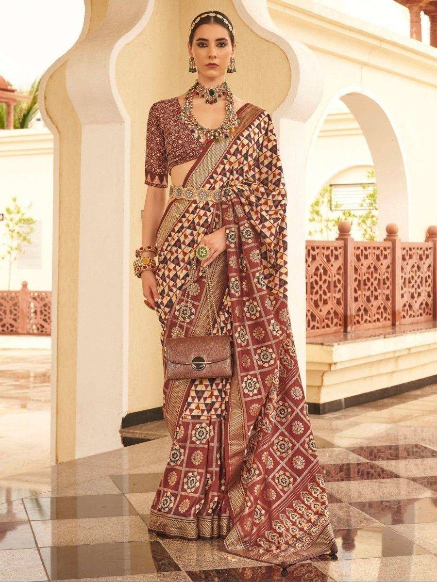 Elegant maroon geometric print saree with matching blouse, perfect for Indian ethnic occasions