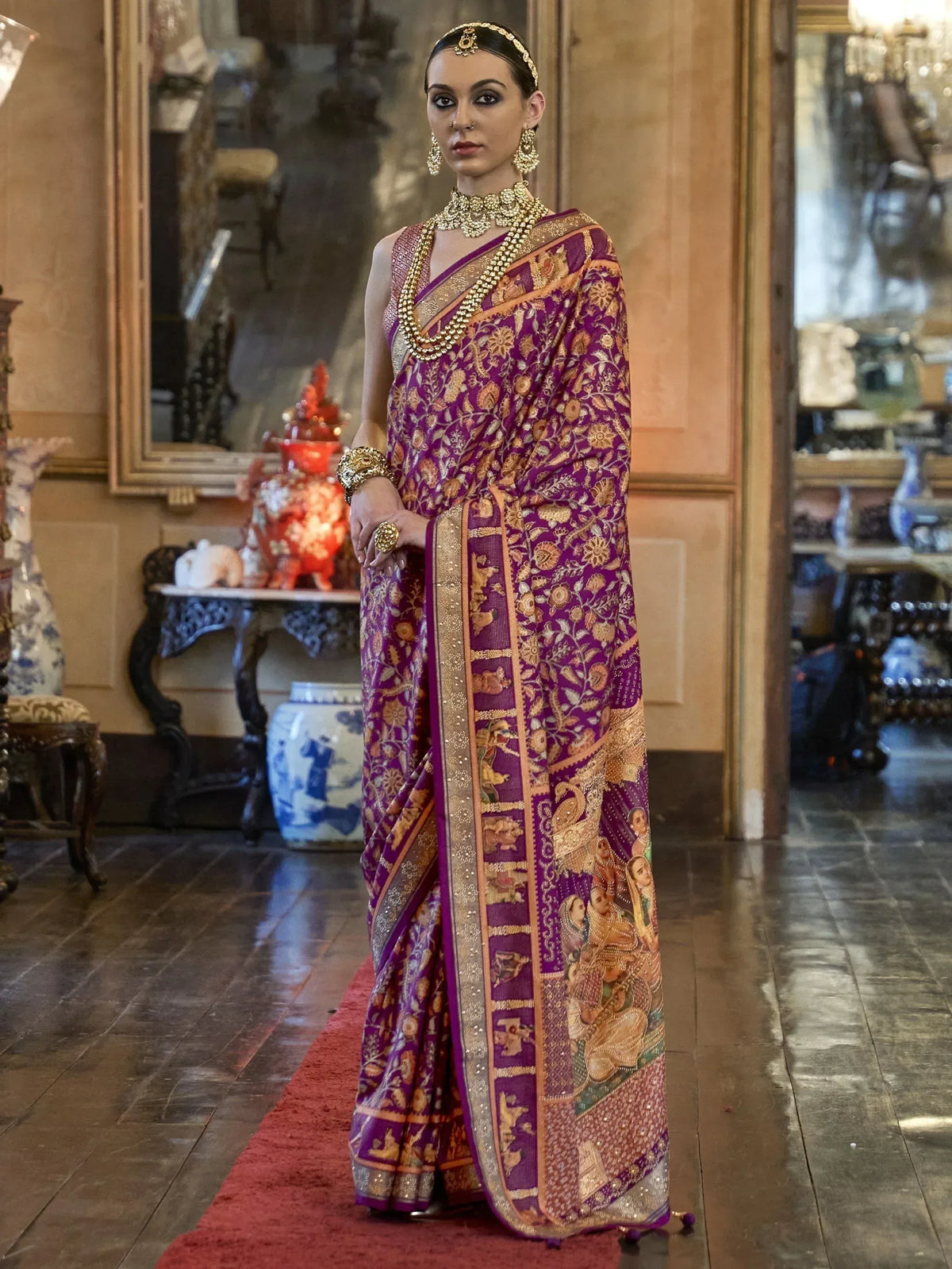 Purple floral embroidered saree with gold border, traditional Indian ethnic wear for weddings and festivals