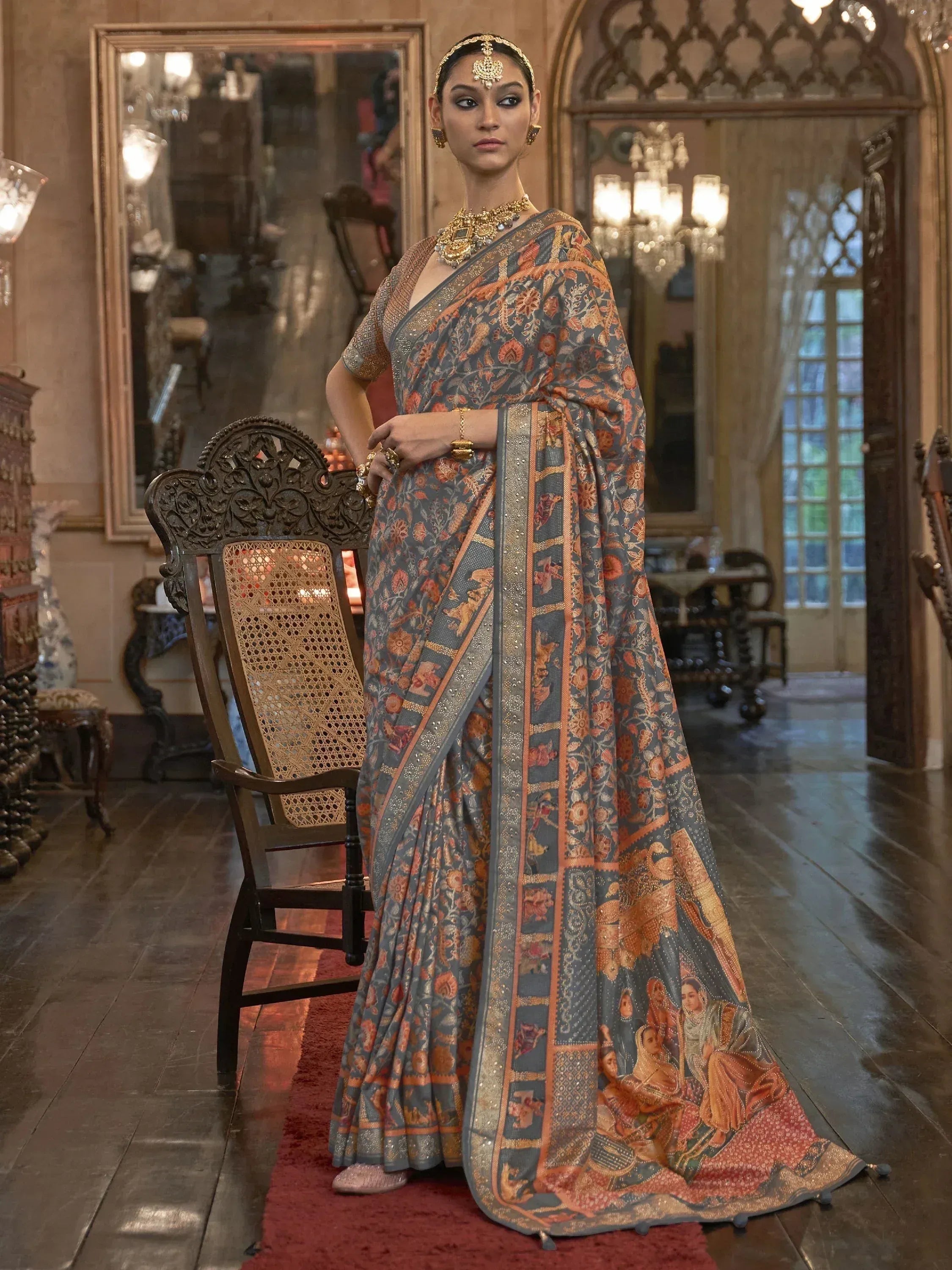 Elegant Indian saree with intricate floral and figurative print, perfect for ethnic occasions and festive wear.