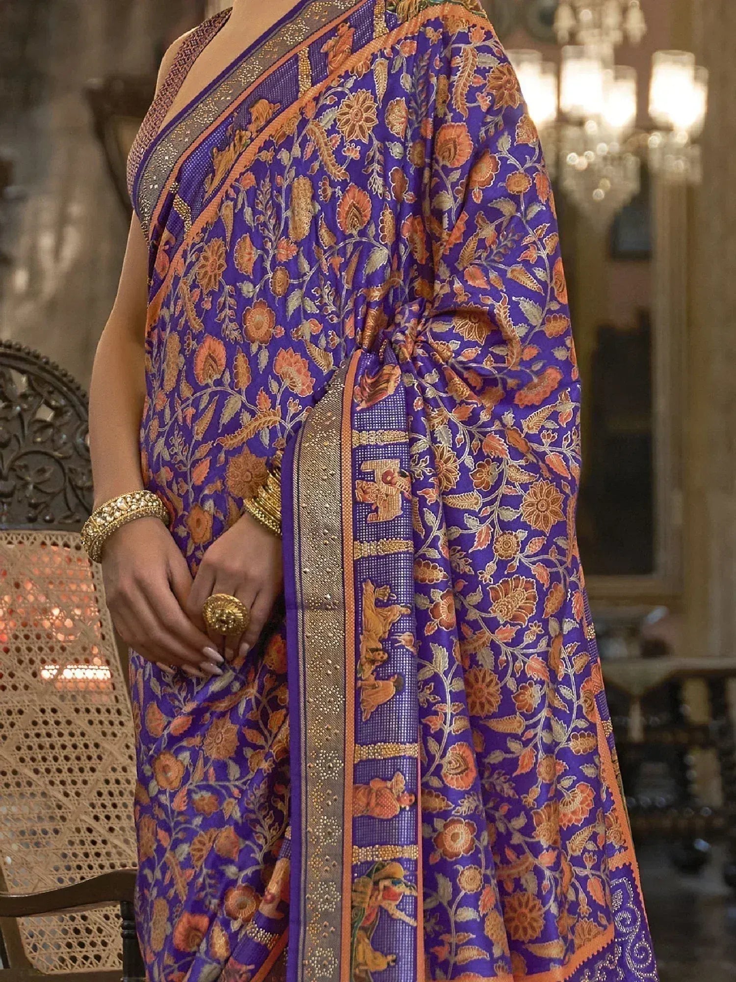 Purple floral saree with gold border and elephant motifs, Indian ethnic wear