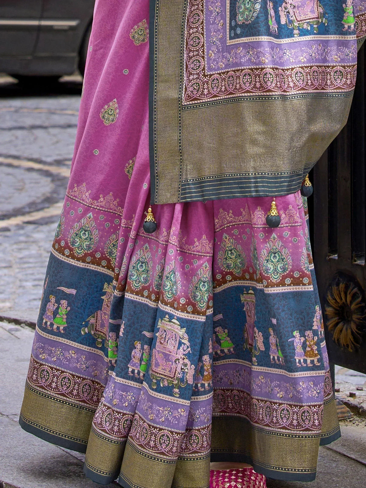 Purple and blue printed lehenga choli with intricate paisley and folk art motifs, perfect for ethnic wear.