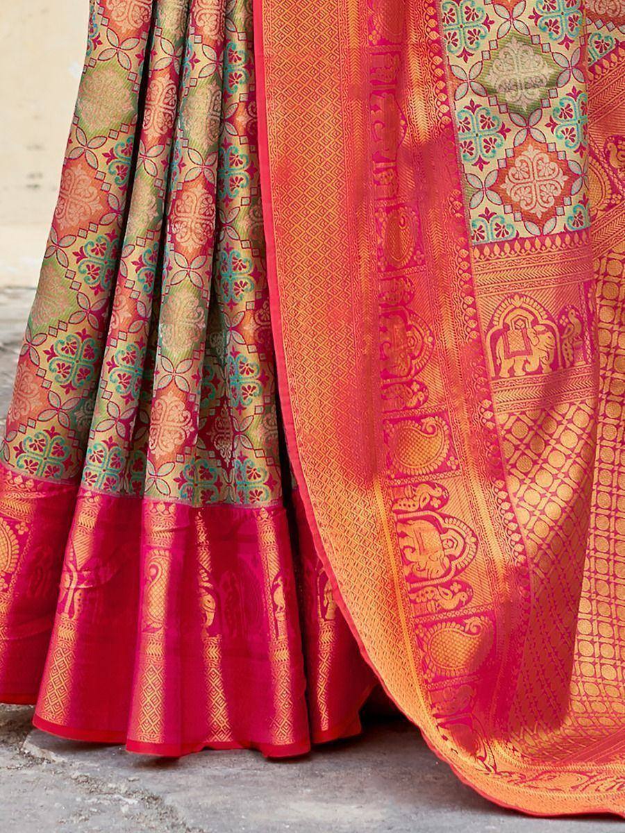 Vibrant orange and pink Banarasi saree with intricate elephant and floral motifs, perfect for Indian ethnic wear.