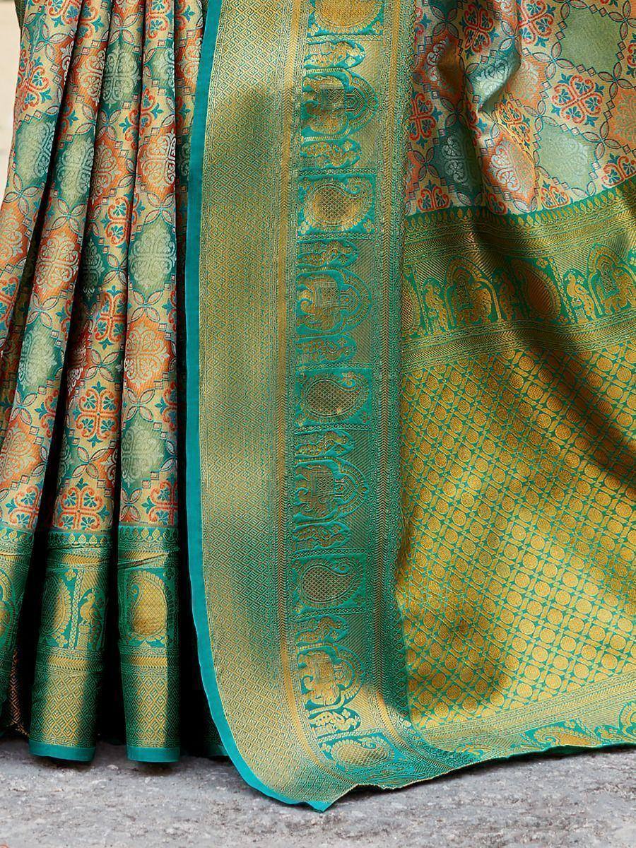 Teal and gold Banarasi saree with intricate elephant motifs and woven border, perfect for ethnic occasions