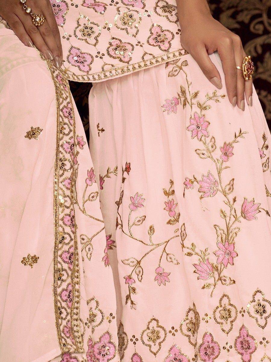 Pink floral embroidered lehenga choli with gold detailing, perfect for Indian ethnic wear occasions