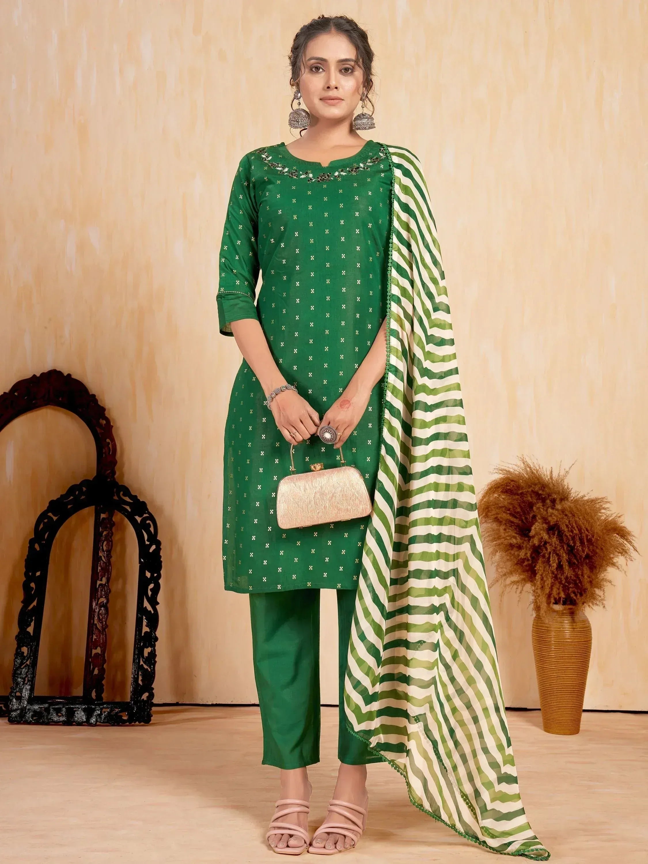 Green ethnic salwar kameez with striped dupatta and embellished neckline