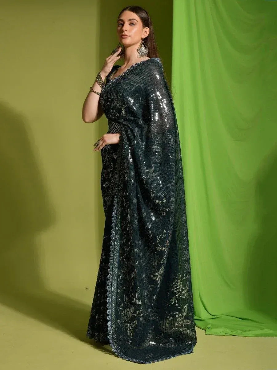 Elegant dark green sequin saree with floral embroidery, perfect for Indian ethnic wear occasions