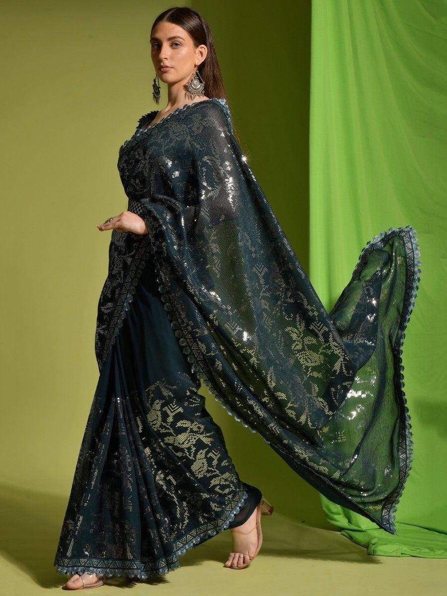 Elegant dark green sequined saree with gold embroidery, perfect for Indian ethnic wear occasions