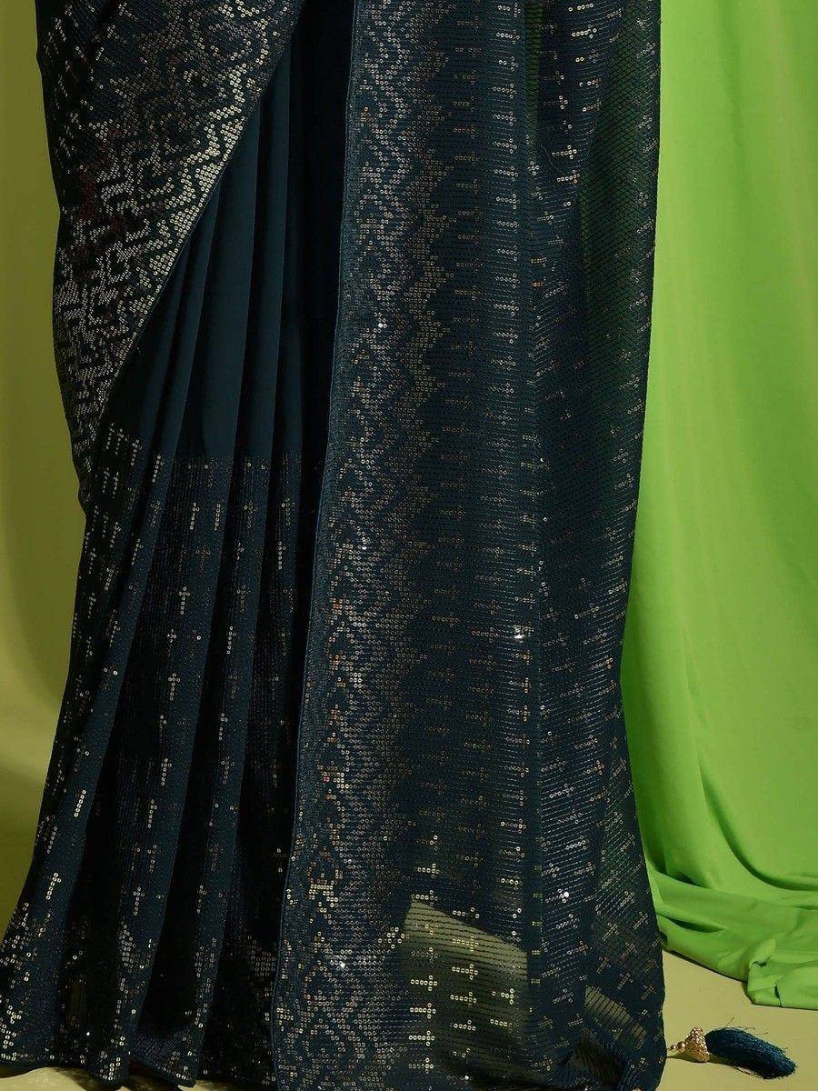 Dark blue sequin saree with sheer overlay, elegant Indian ethnic wear for festive occasions