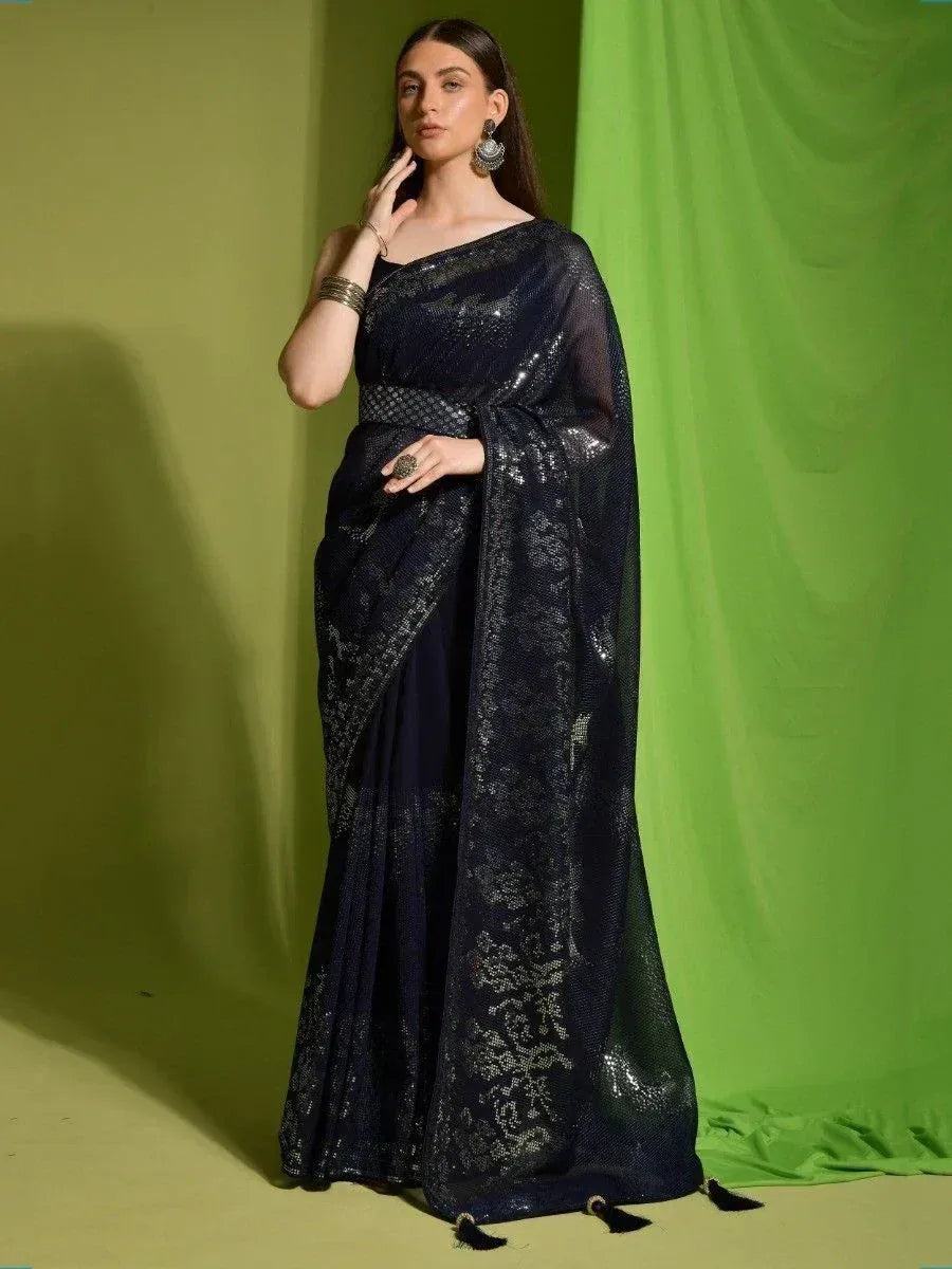 Navy blue sequin saree with floral embroidery, perfect for Indian ethnic occasions and festive wear.