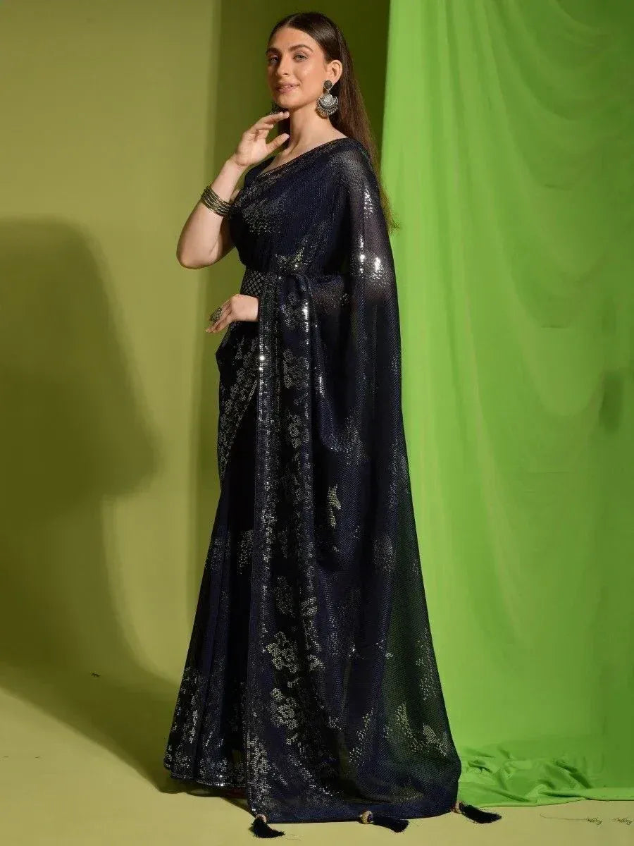 Navy blue sequin saree with floral embroidery, elegant Indian ethnic wear for festive occasions