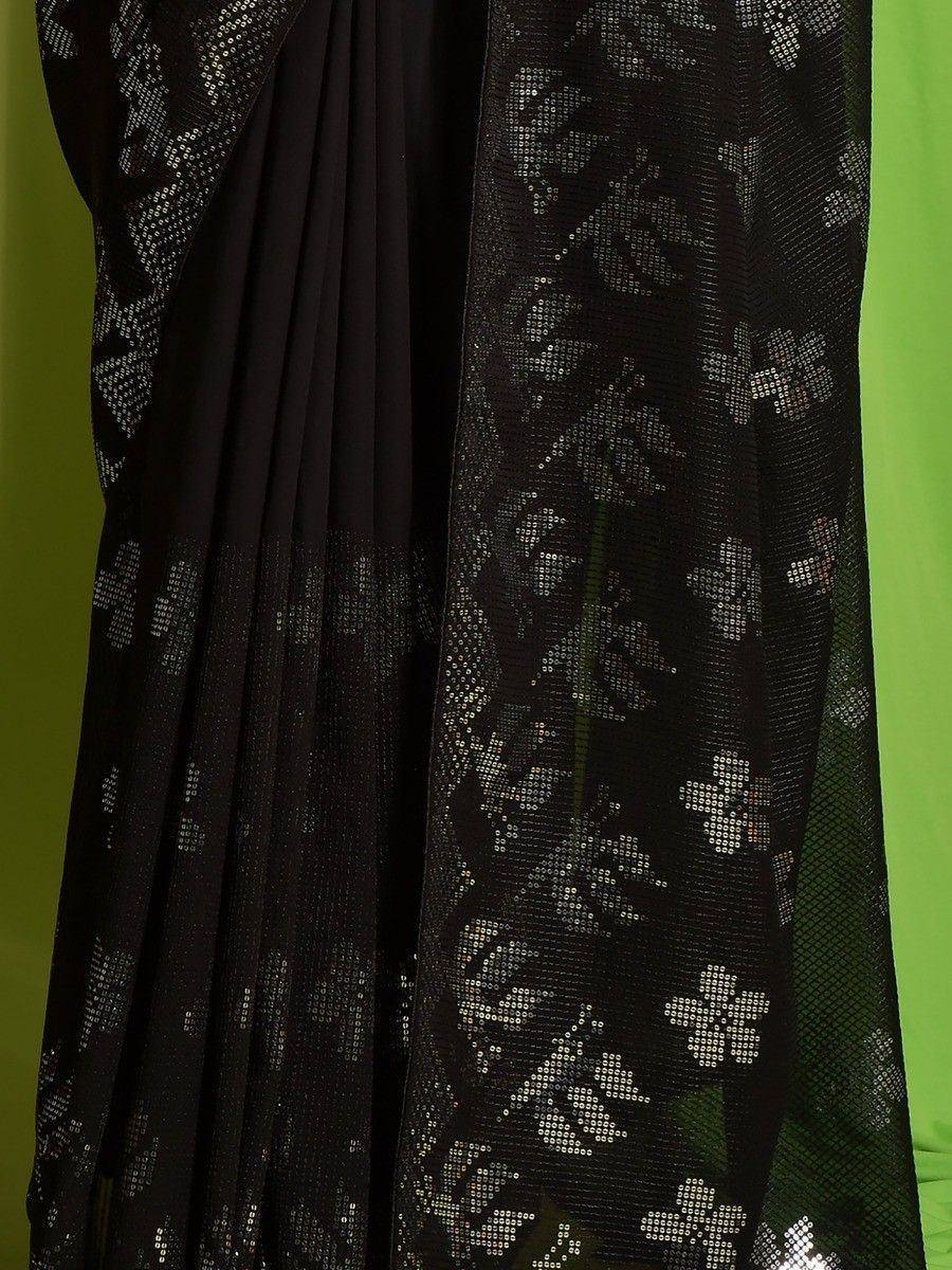 Black ethnic gown with sequin floral embroidery, perfect for festive occasions and parties.
