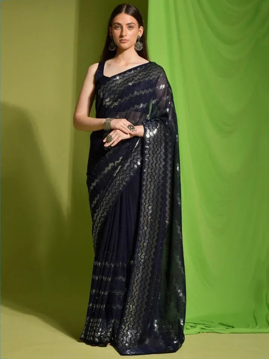 Navy blue sequin saree with sheer pallu, perfect for Indian ethnic wear events