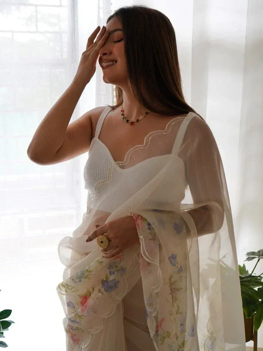 White floral saree with scalloped border, elegant ethnic wear for women