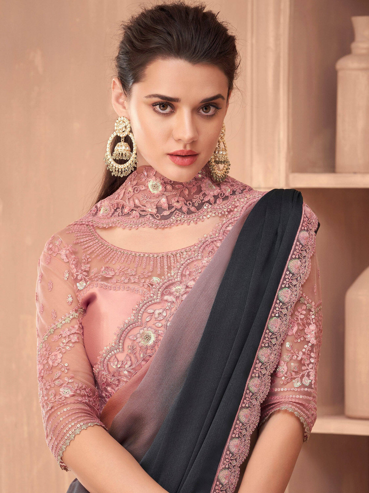 Pink embroidered saree blouse with sheer lace and gold jhumka earrings, Indian ethnic wear