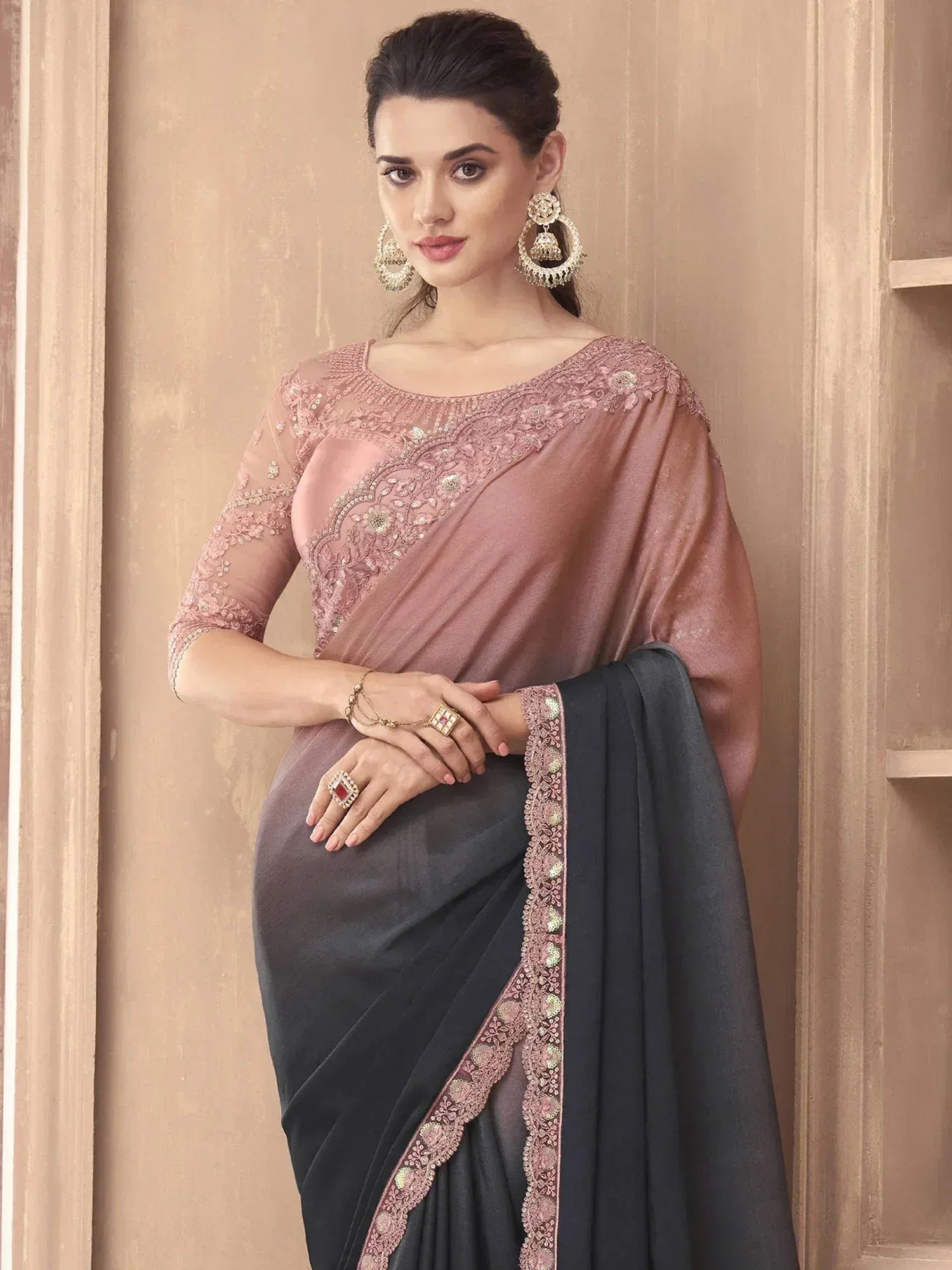Elegant black and pink embroidered saree with designer blouse, perfect for Indian ethnic occasions