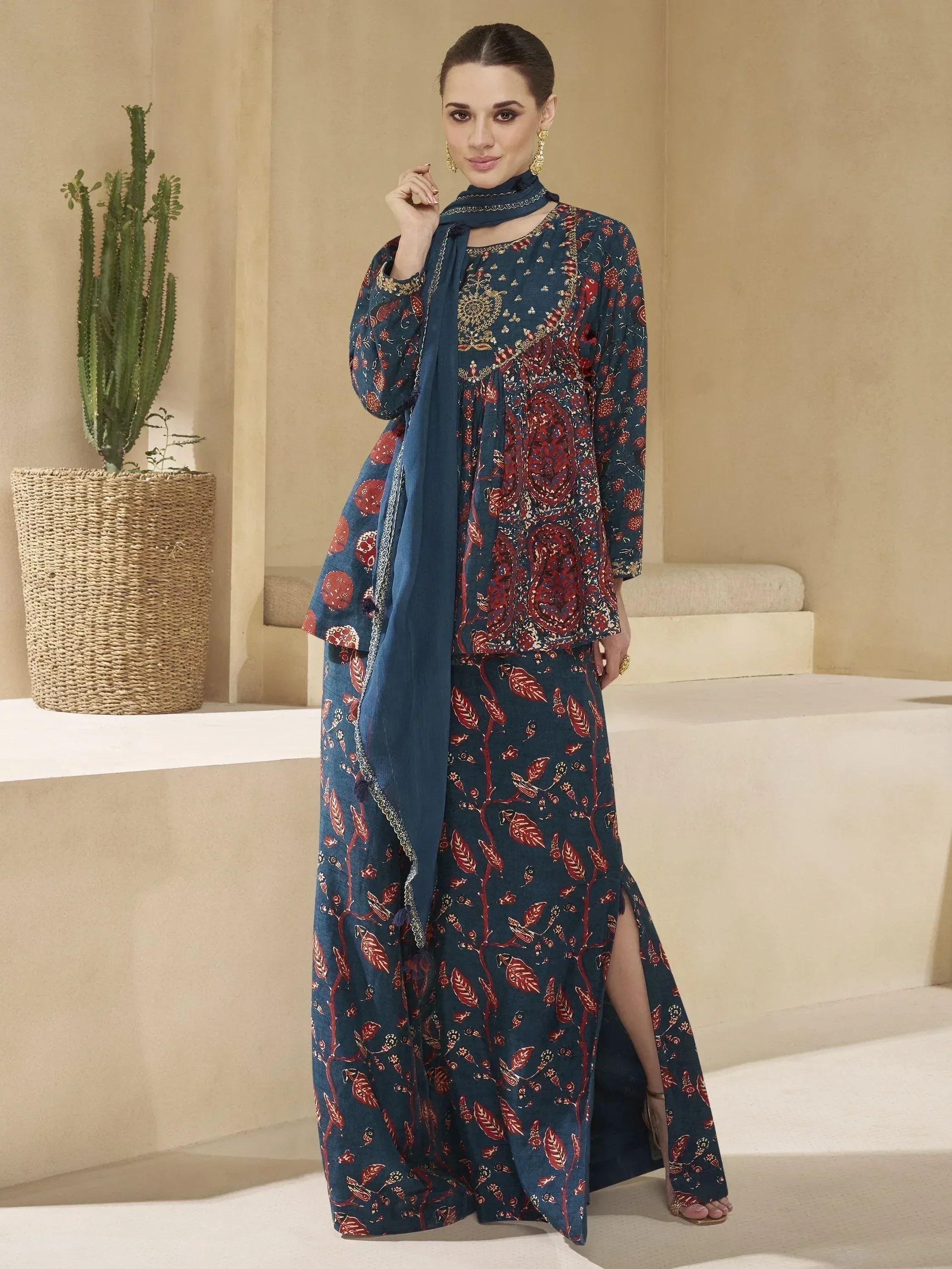 Blue and red floral printed ethnic gown with matching dupatta, perfect for Indian occasions.