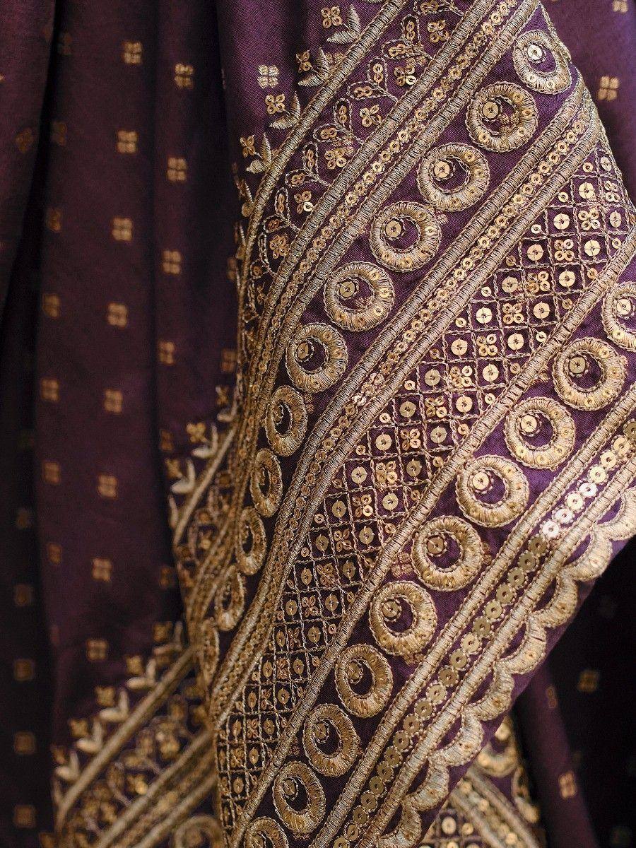 Purple ethnic wear with gold embroidery and sequin detailing, perfect for festive occasions.