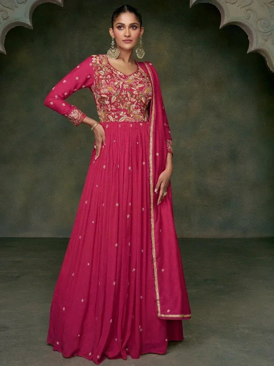 Pink embroidered anarkali suit with gold detailing, perfect for Indian ethnic occasions