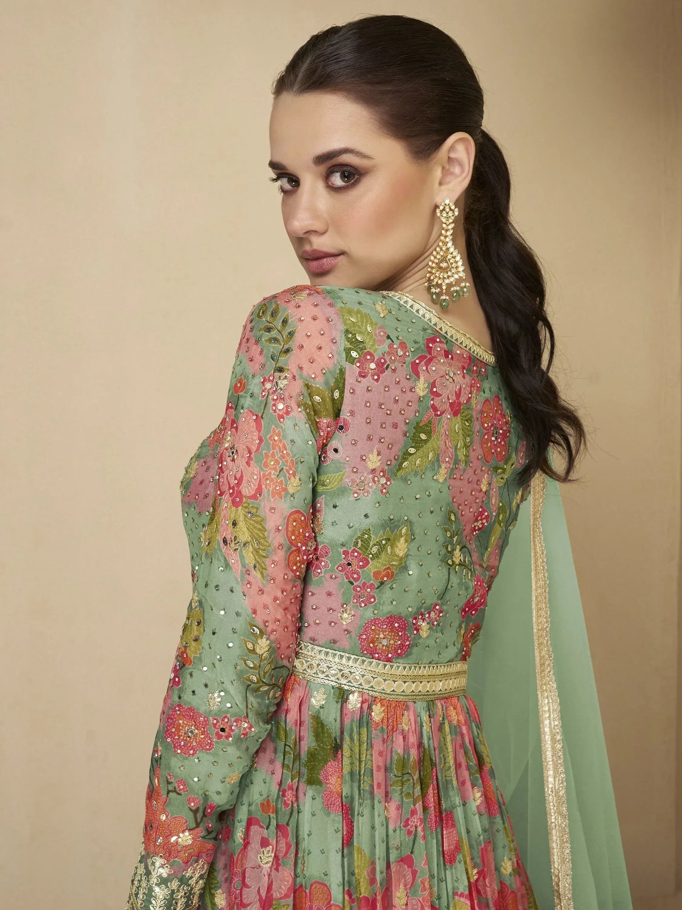 Floral printed Indian ethnic gown with gold embroidery and dupatta, perfect for festive occasions