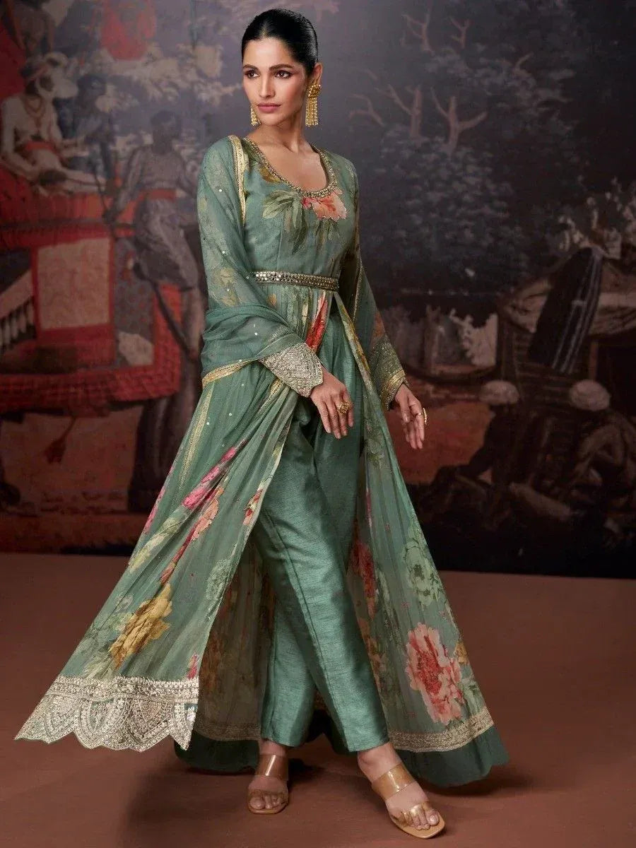 Elegant green floral print ethnic gown with gold embroidery and dupatta, perfect for Indian occasions.