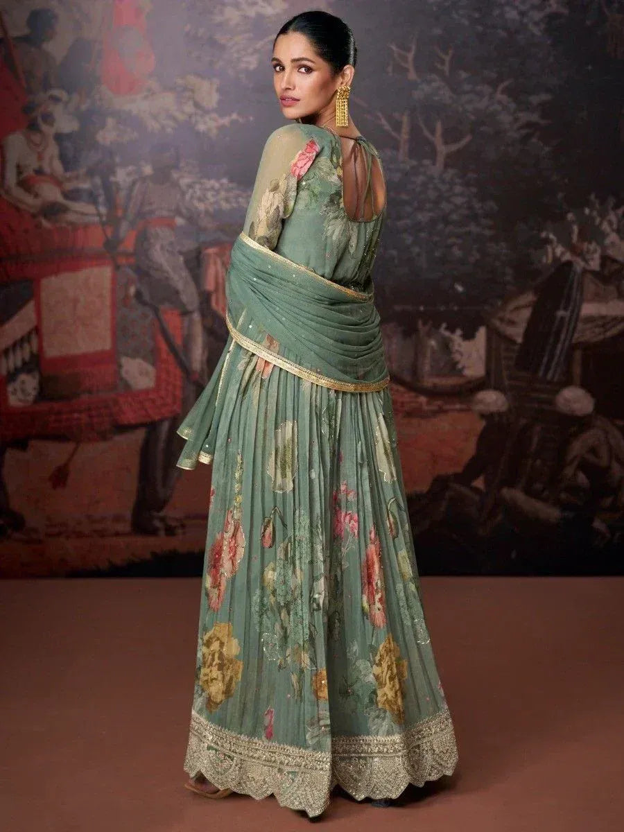 Green floral printed lehenga choli with gold border, elegant ethnic wear for women