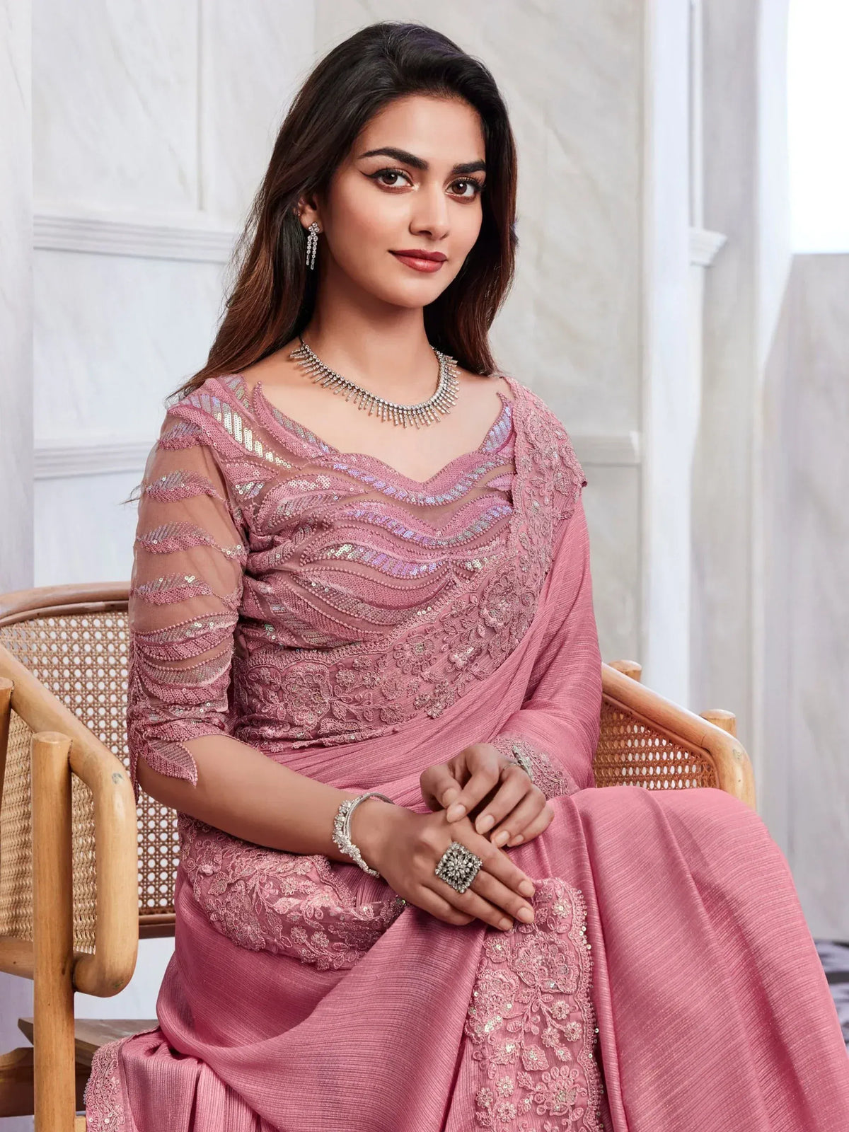 Elegant pink embroidered saree with sequin detailing, perfect for Indian ethnic occasions