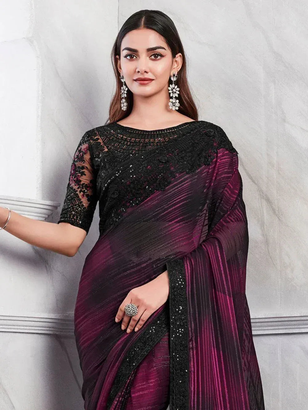 Elegant purple and black embroidered saree with lace blouse, perfect for Indian ethnic occasions