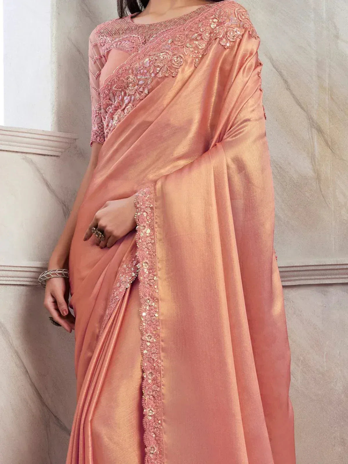 Pink designer saree with embroidered blouse and sequin border, elegant Indian ethnic wear