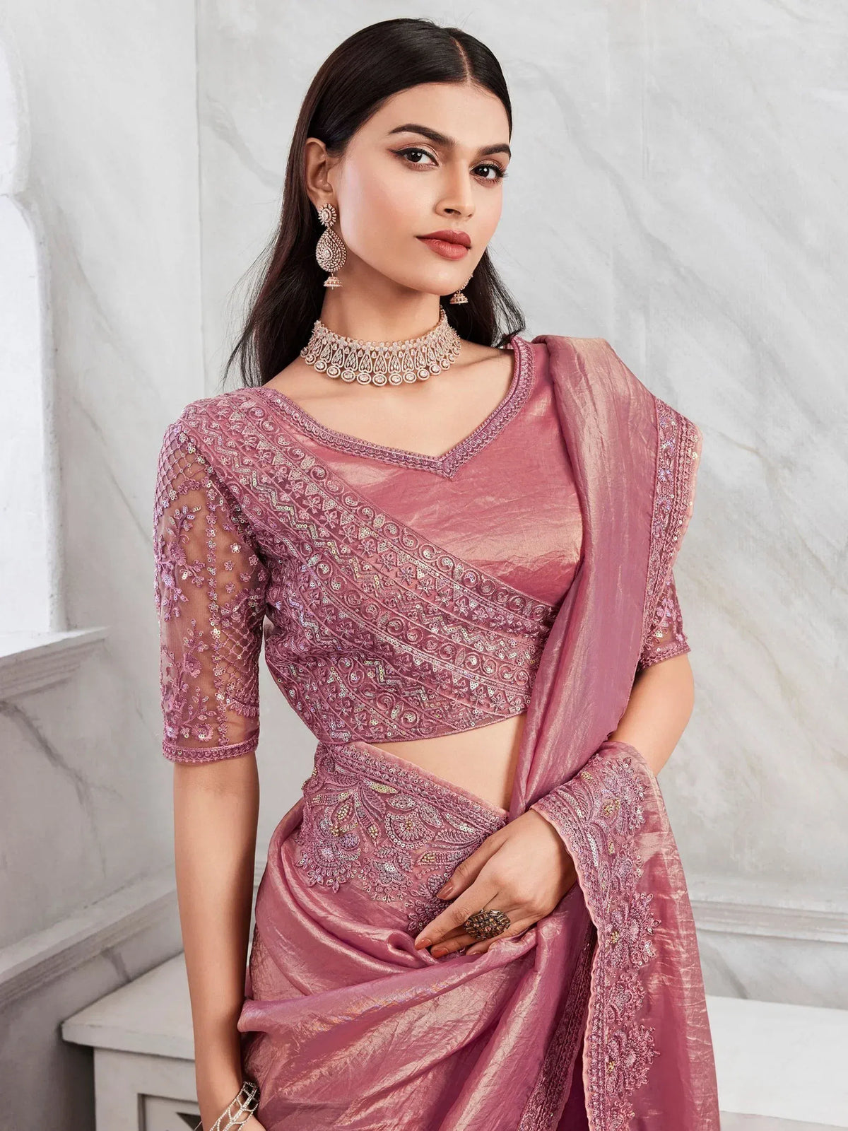 Pink embroidered saree with sheer blouse, perfect for Indian ethnic wear and festive occasions