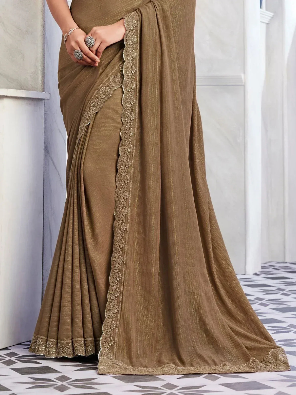 Elegant olive green saree with gold lace border, perfect for Indian ethnic occasions