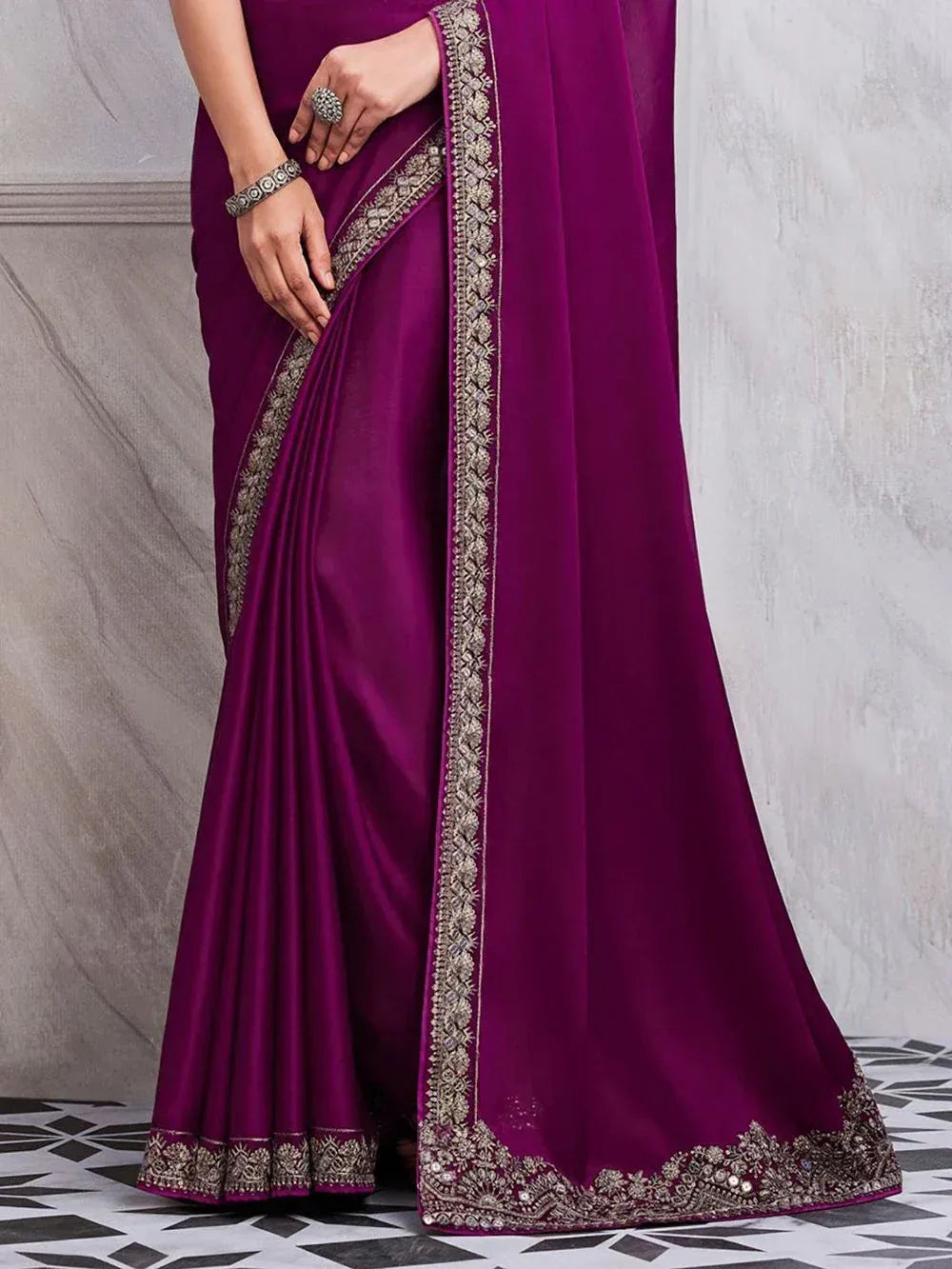 Purple designer saree with intricate gold embroidery, perfect for Indian ethnic wear occasions