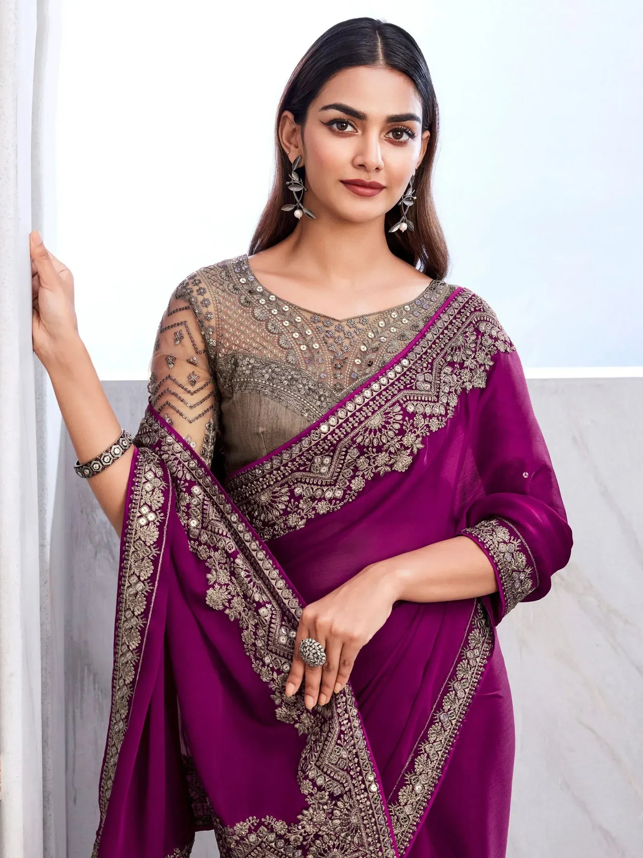 Elegant purple saree with gold embroidery, perfect for Indian ethnic wear and festive occasions