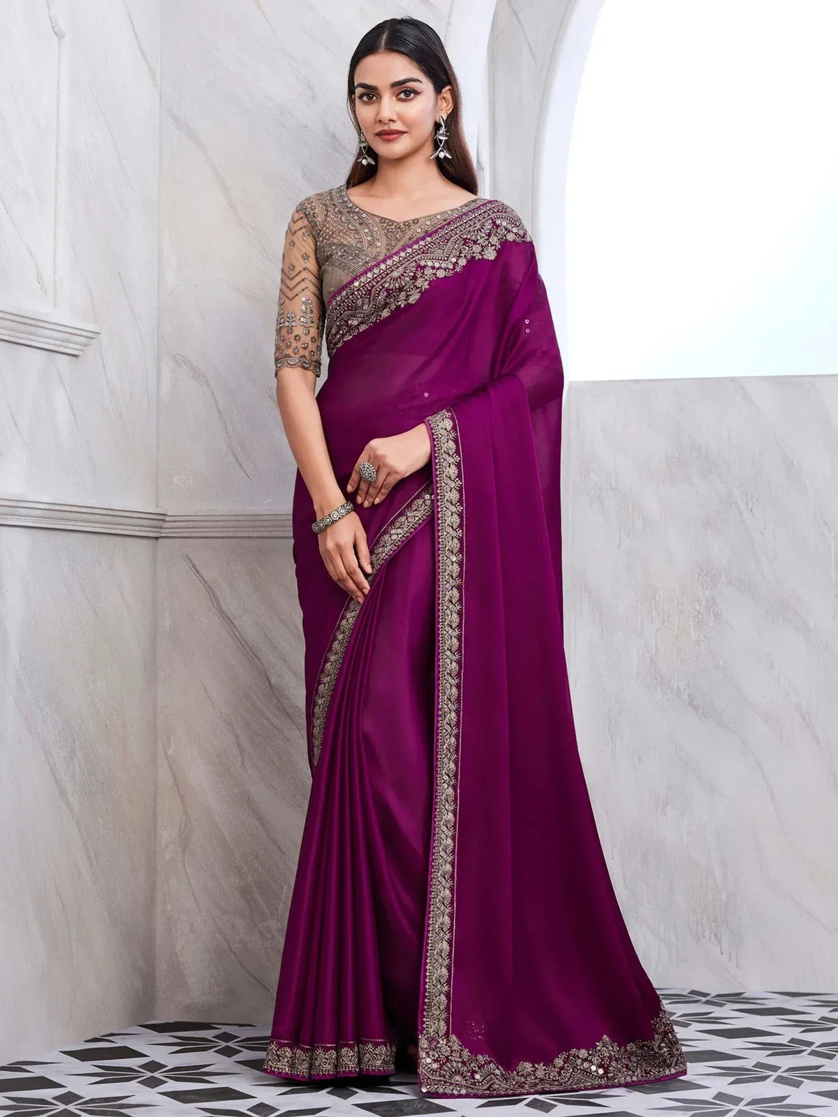 Elegant purple saree with gold embroidery, perfect for Indian ethnic wear occasions
