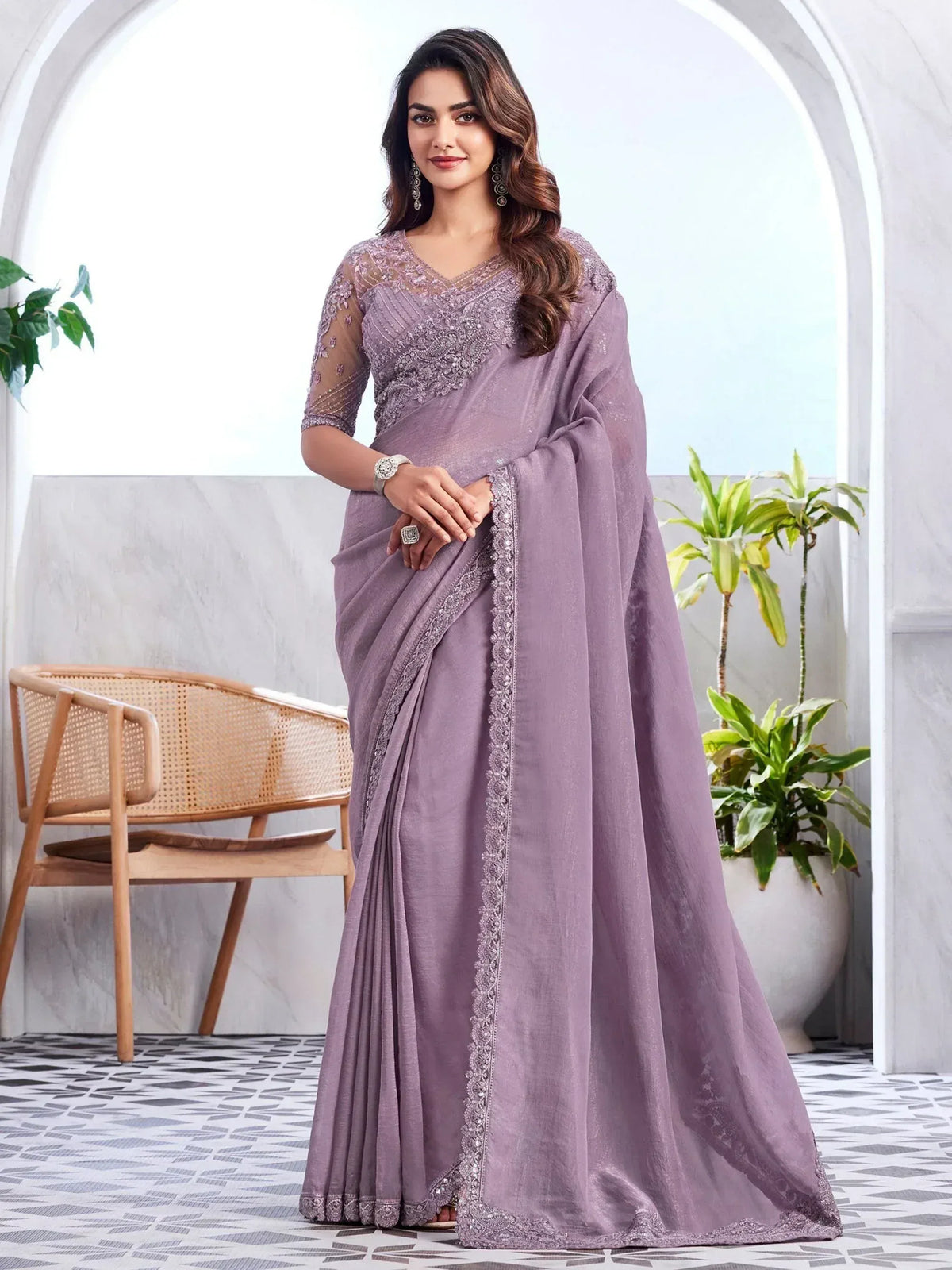Elegant lavender saree with intricate embroidery and sheer sleeves, perfect for Indian ethnic occasions
