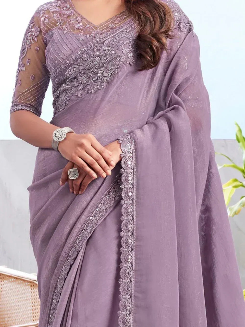 Lavender designer saree with heavy embroidery and sheer blouse, perfect for Indian ethnic wear occasions