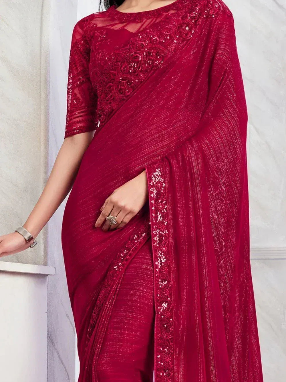 Red sequin-embellished saree with lace blouse, ethnic Indian wear for festive occasions