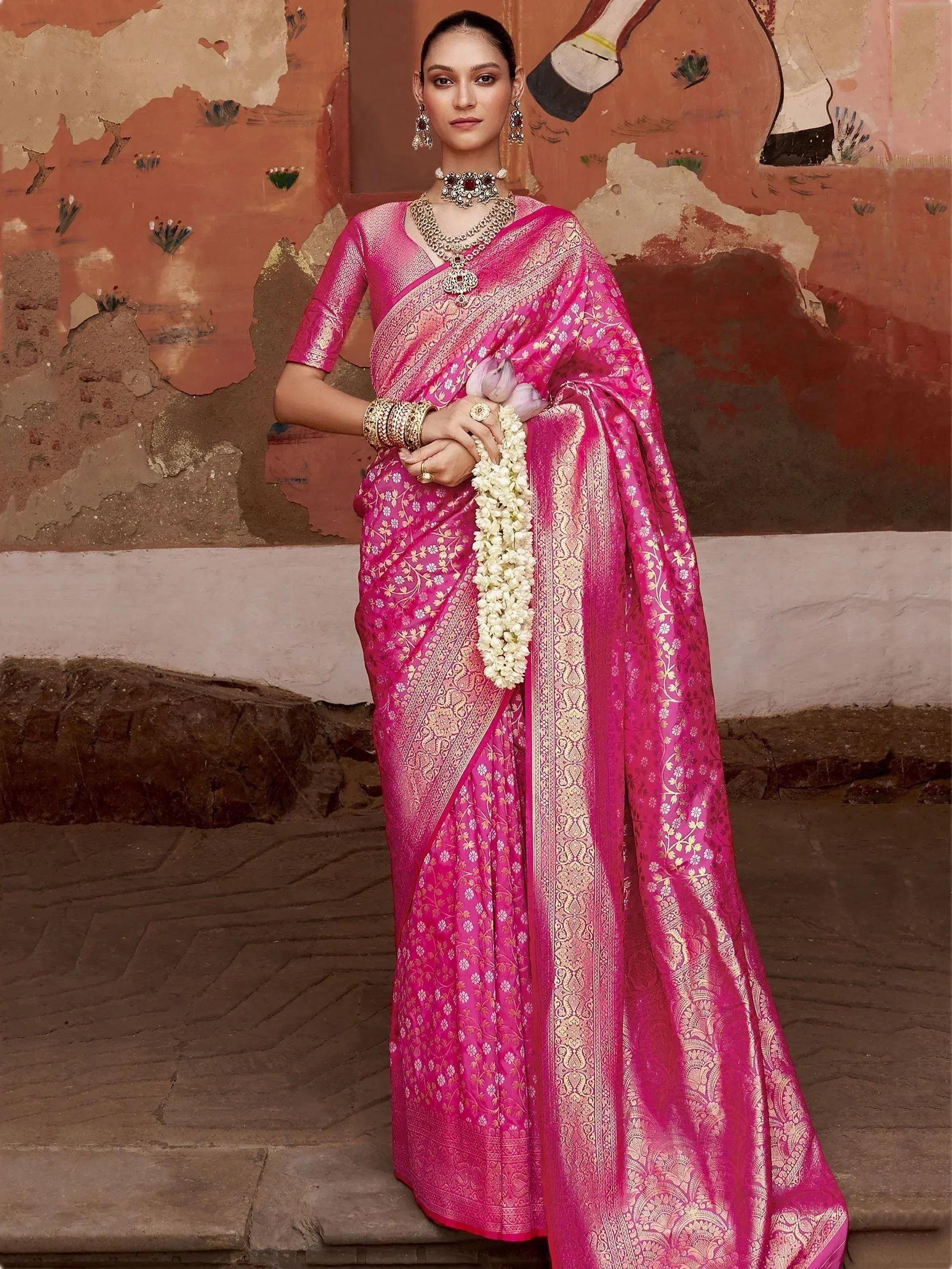 Pink floral saree with gold zari border, traditional Indian ethnic wear for women
