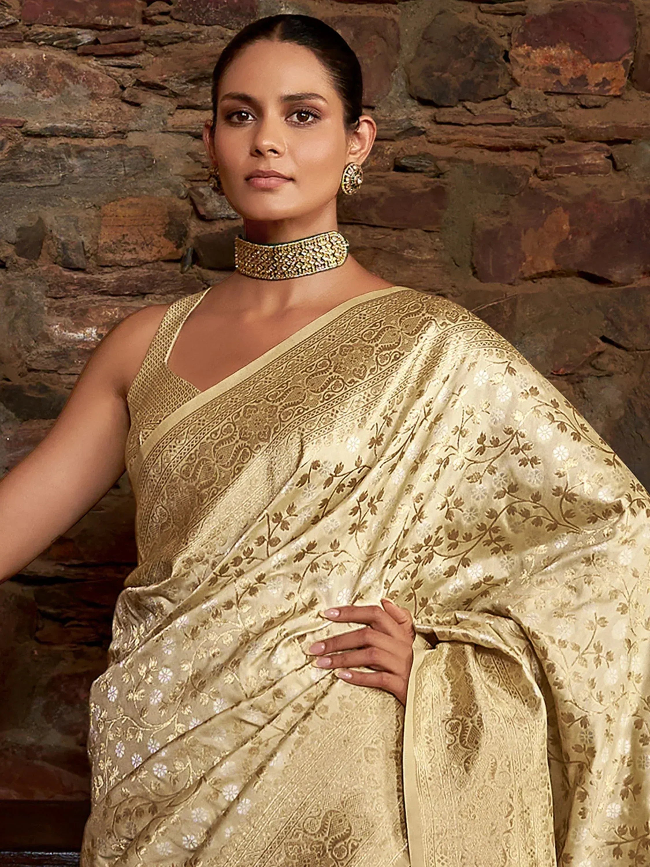 Elegant gold floral saree with intricate embroidery, perfect for Indian ethnic wear occasions.