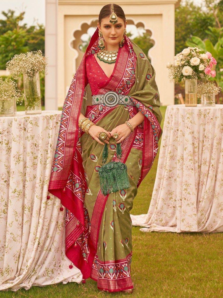 Olive green and pink designer saree with intricate embroidery, perfect for Indian ethnic wear occasions
