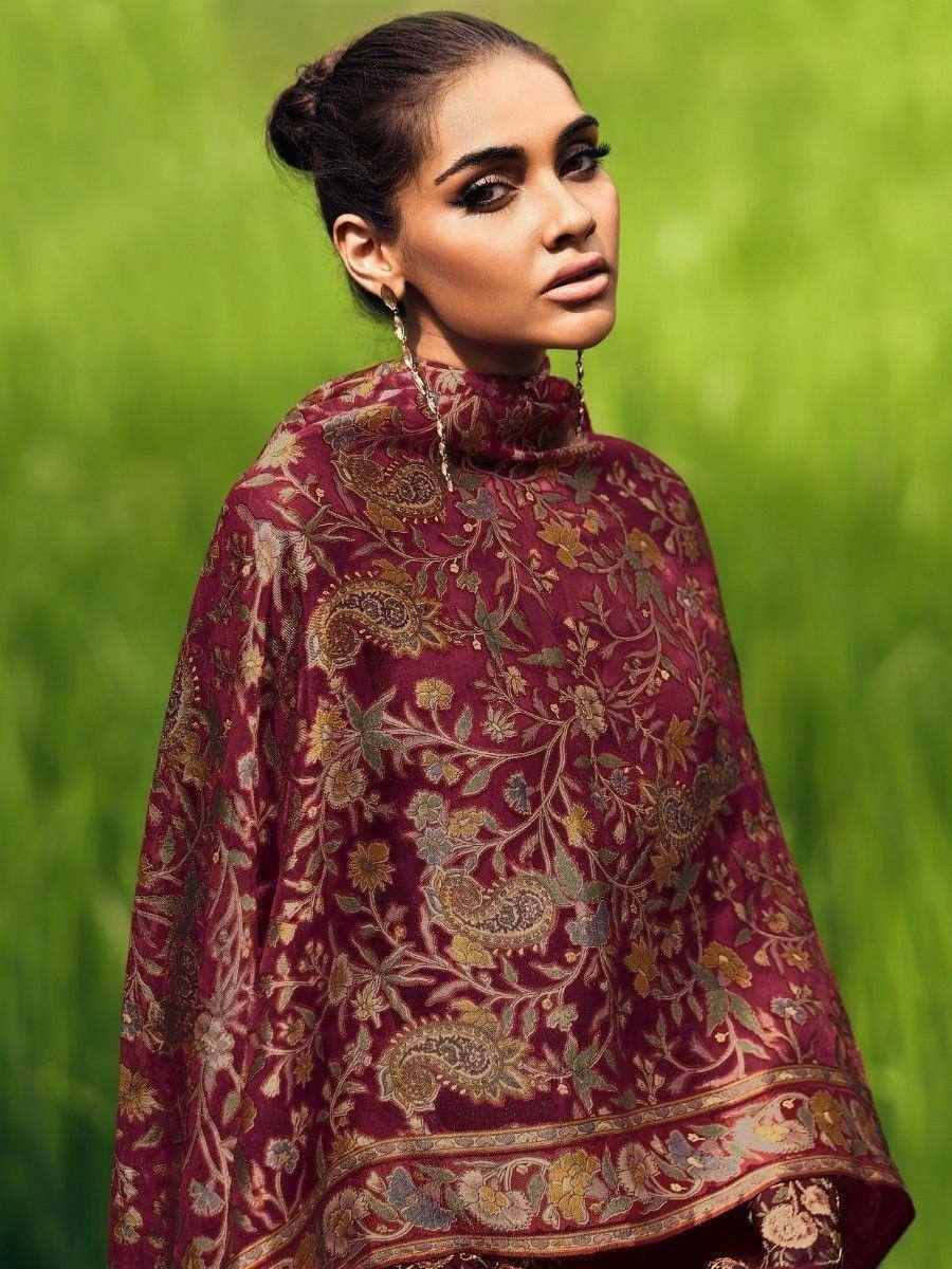 Elegant maroon floral ethnic gown with intricate paisley design, perfect for Indian festive wear.