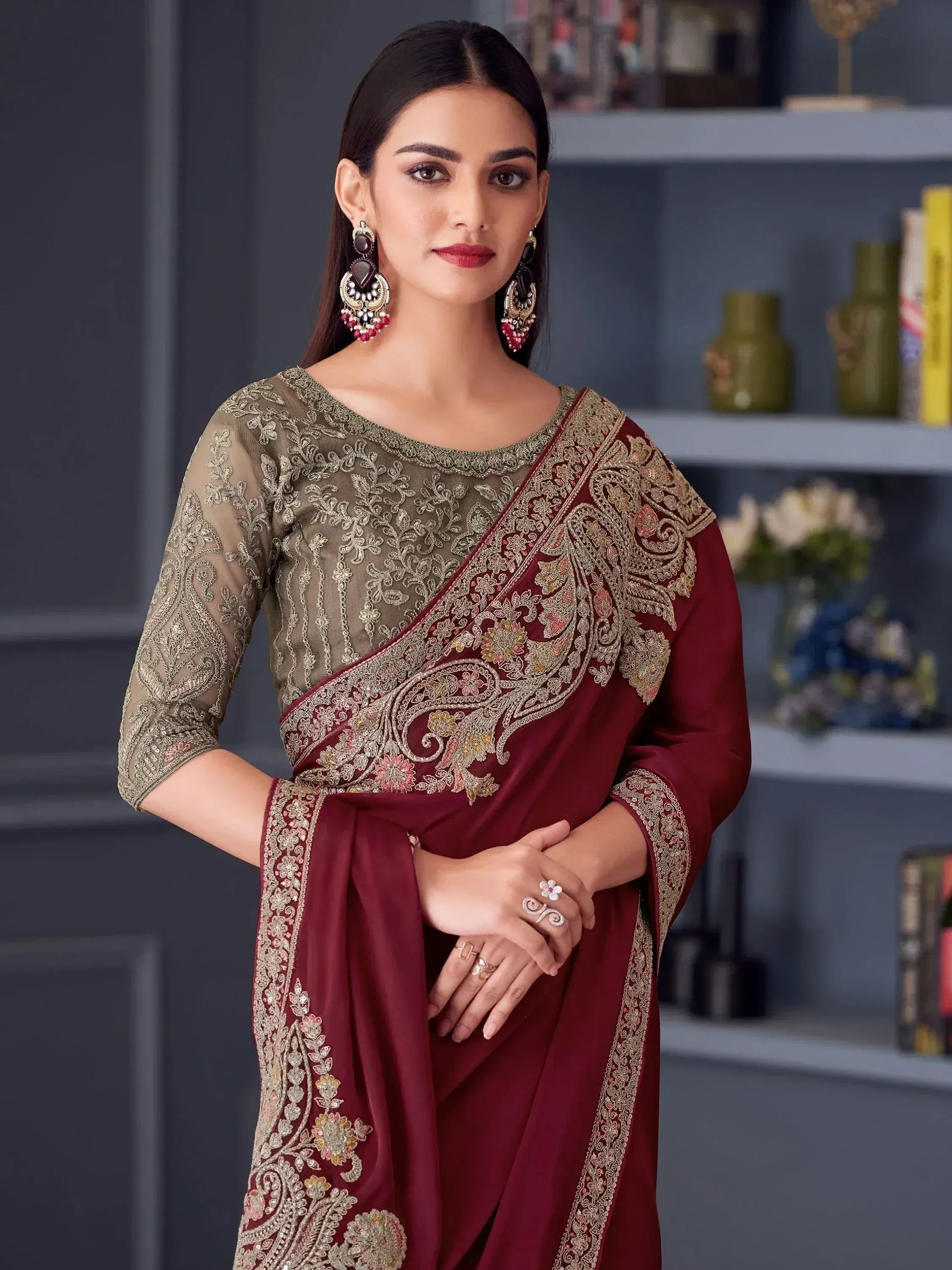 Elegant maroon and olive green embroidered saree with gold detailing, perfect for Indian ethnic occasions.